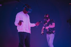 2 people with Virtual Reality VR headsets on