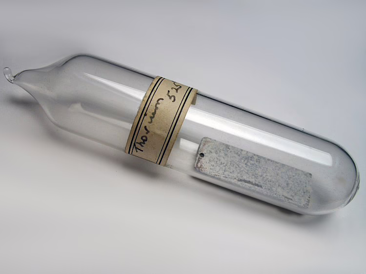 Corroded thorium metal in a sealed ampule