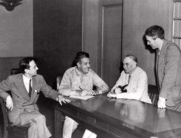James Chadwick (left) advising Major General Leslie R. Groves, who directed the Manhattan Project, 1945