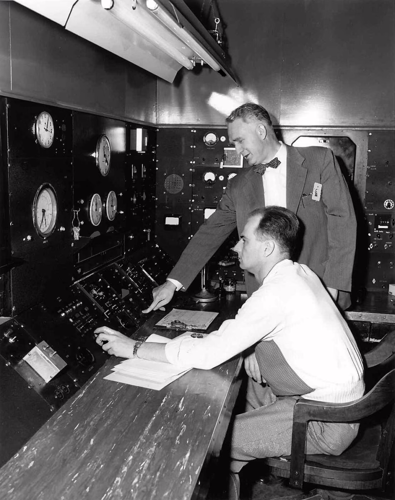 Walter Zinn presses the button which shuts down experimental reactor CP-3 for the last time.