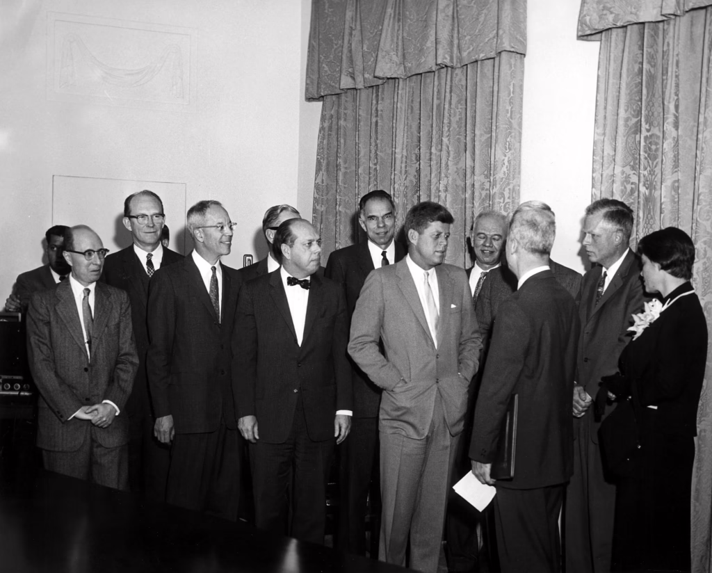 Willard Libby (second left) in attendance at the presentation of the Enrico Fermi Award to Hans Bethe, 1961