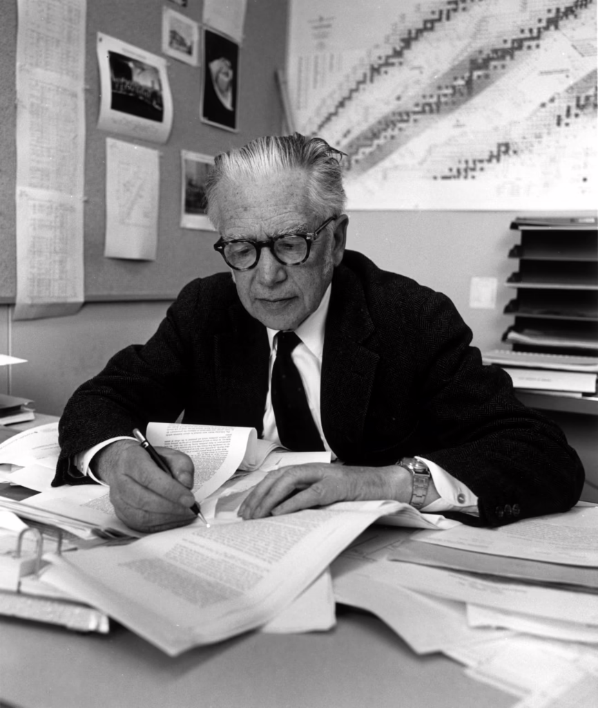 Emilio Segrè working on proofs of a book on Enrico Fermi