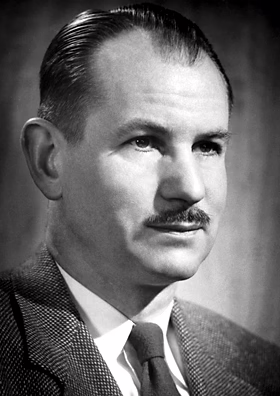 Portrait of Edwin McMillan, a pioneering American physicist whose discovery of neptunium and leadership at the Berkeley Radiation Laboratory made him one of the most influential figures in modern nuclear and accelerator science.